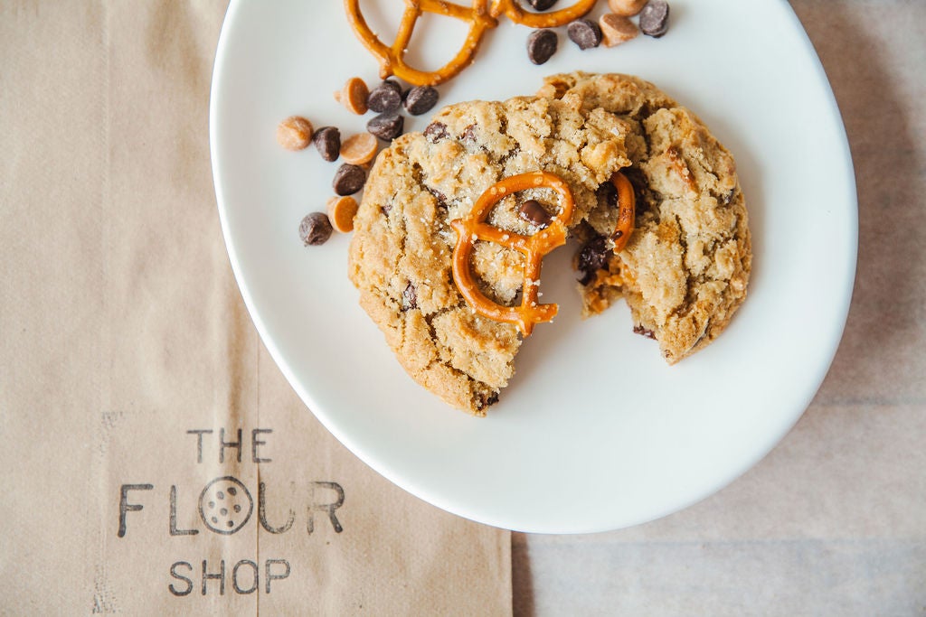 Kitchen sink cookie on a Flour Shop paper bag